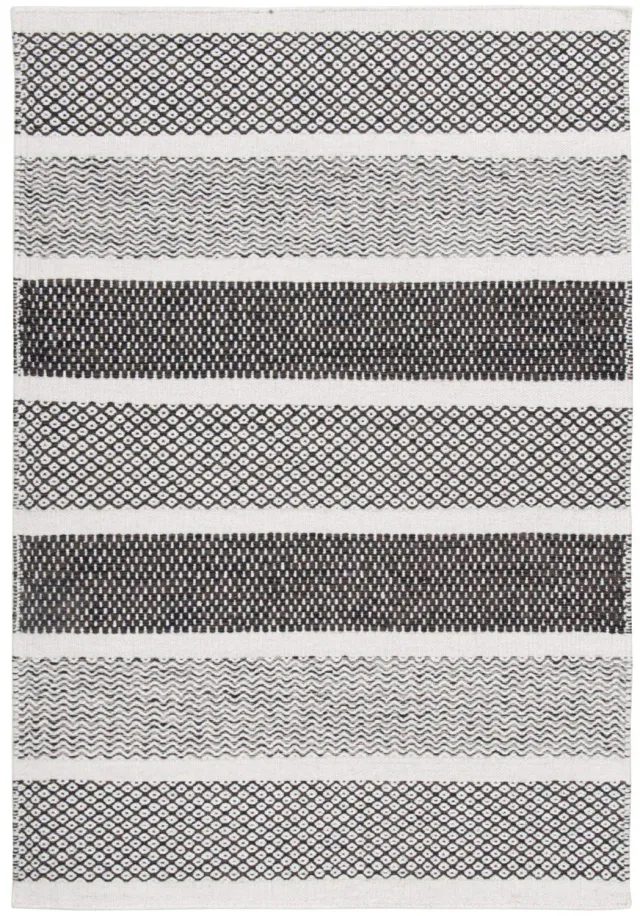THEKO Trondheim Wollteppich 55x80 Natur Grau handgewebt