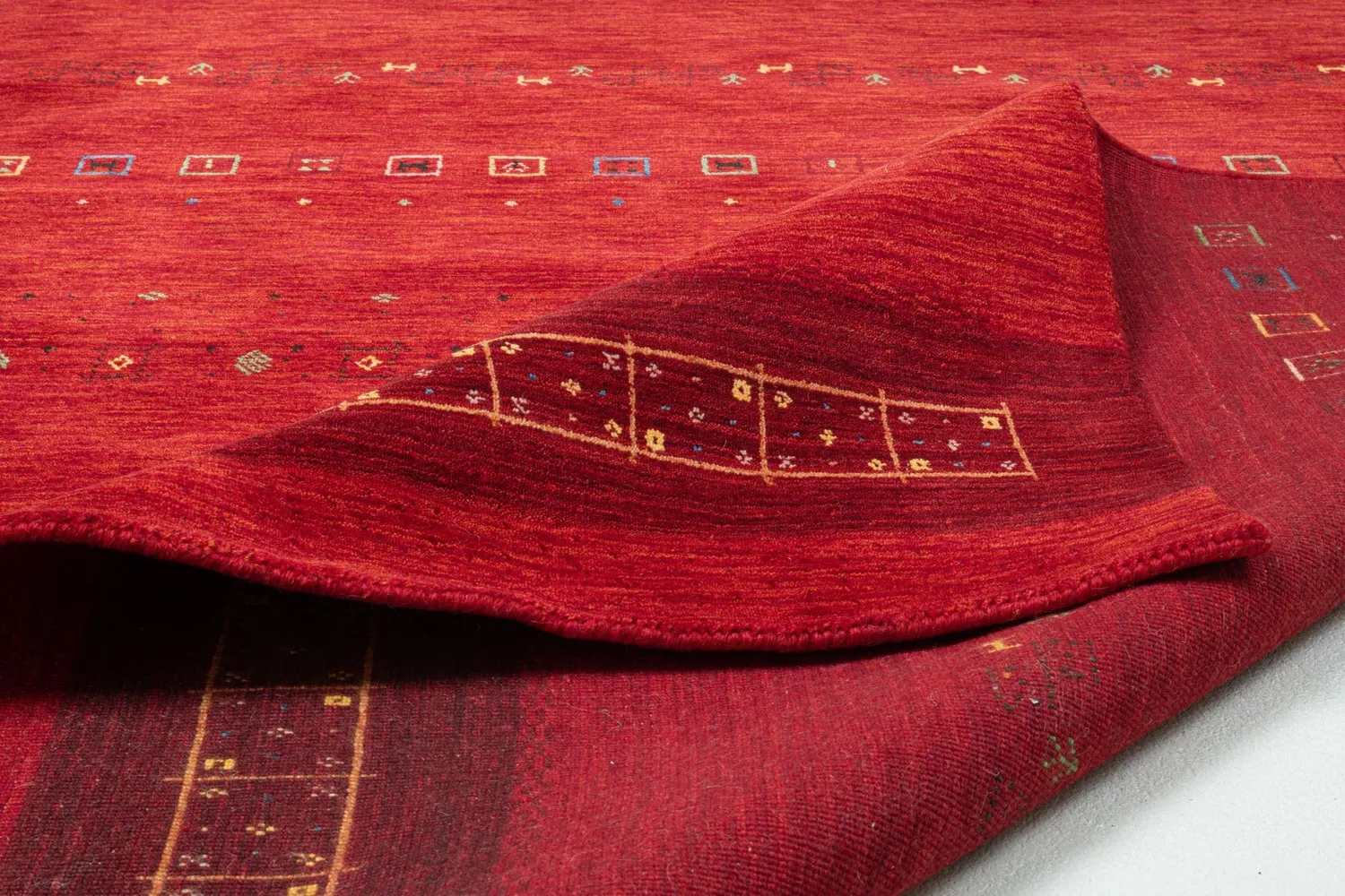 THEKO Lori Dream Gold Teppich 90x160 cm Rot Schurwolle