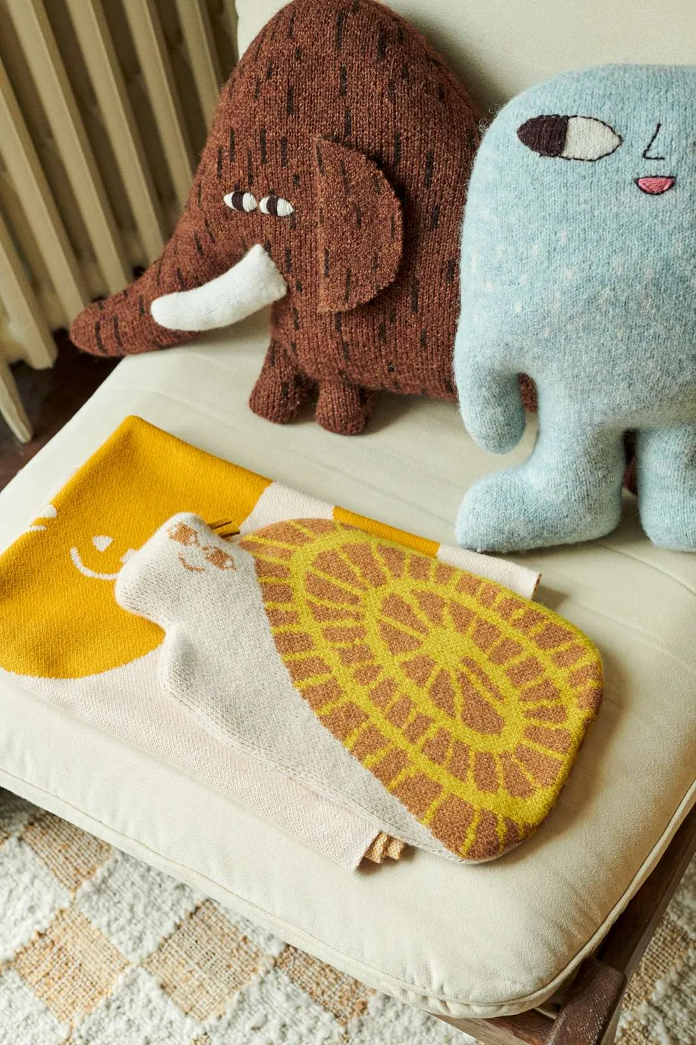 Donna Wilson Snail Wärmflasche Lambswool Bezug