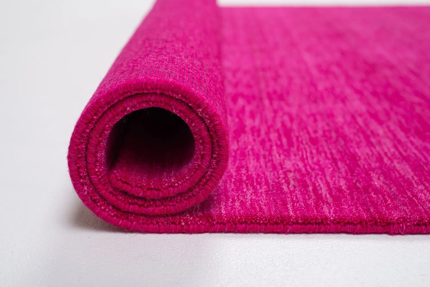 THEKO Holi Teppich 40x60 Pink Schurwolle handgewebt modern
